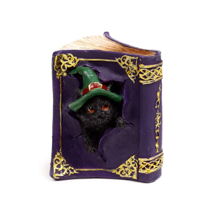 Dekofigur Schwarze Katze aus Zauberbuch kletternd