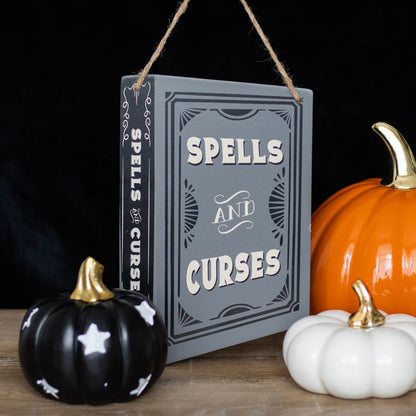 Schild »Spells and Curses«